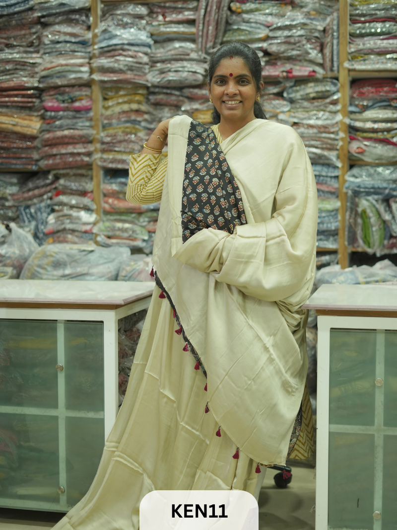 PLAIN MODAL SAREE WITH AJRAKH PRINT BLOUSE