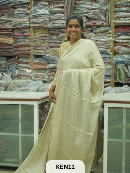 PLAIN MODAL SAREE WITH AJRAKH PRINT BLOUSE