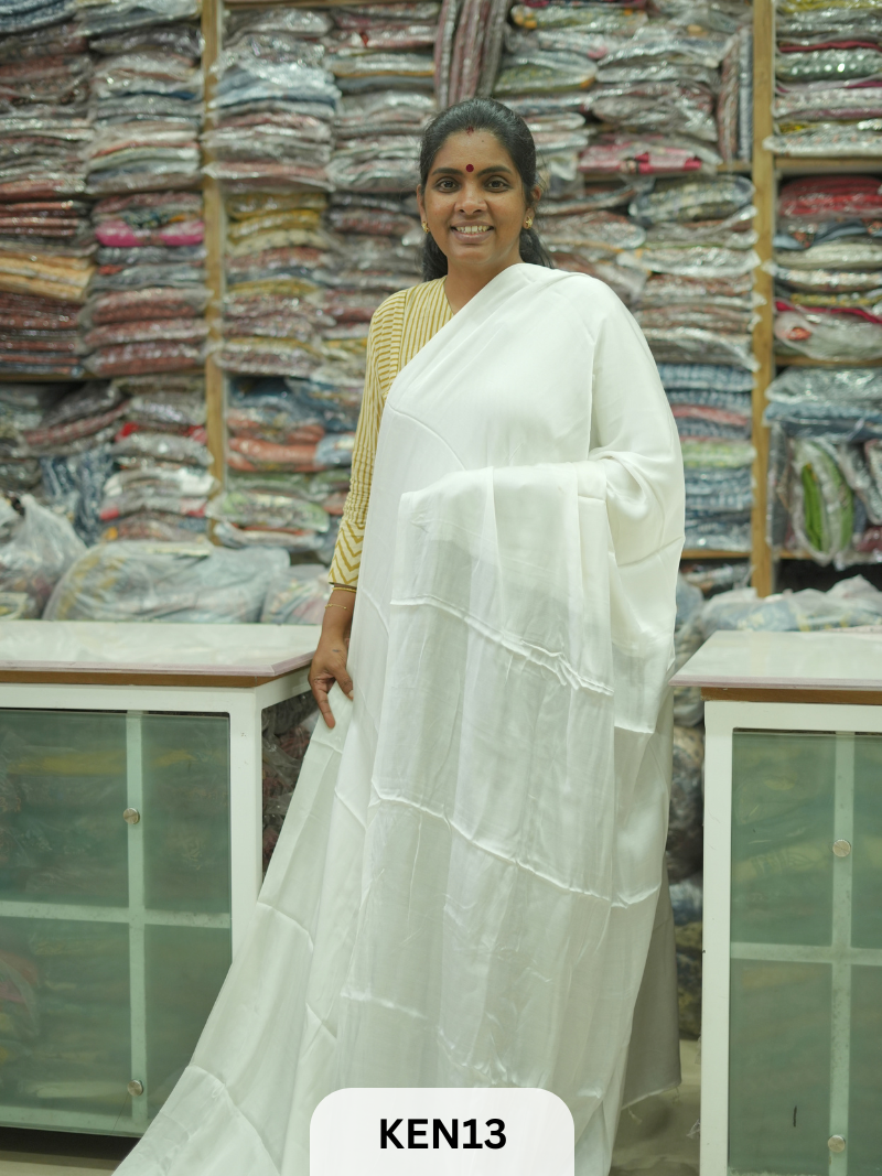 PLAIN MODAL SAREE WITH AJRAKH PRINT BLOUSE
