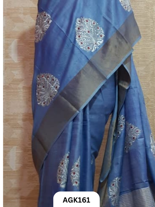 zari border tussar  hand-dyed work machine embroidery. attached blouse piece